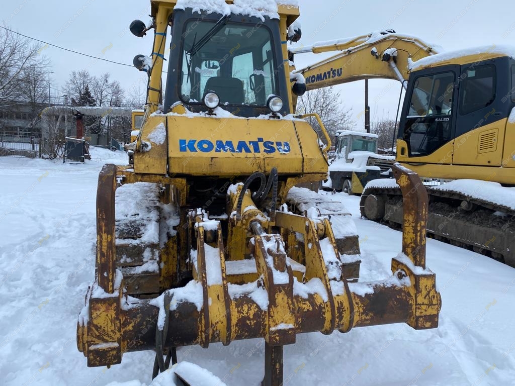 Komatsu D65E-12 [9]