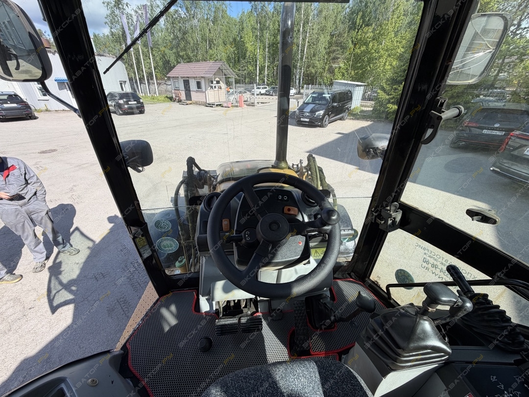 Caterpillar 428E [15]