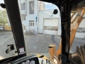 Caterpillar 428E [18]